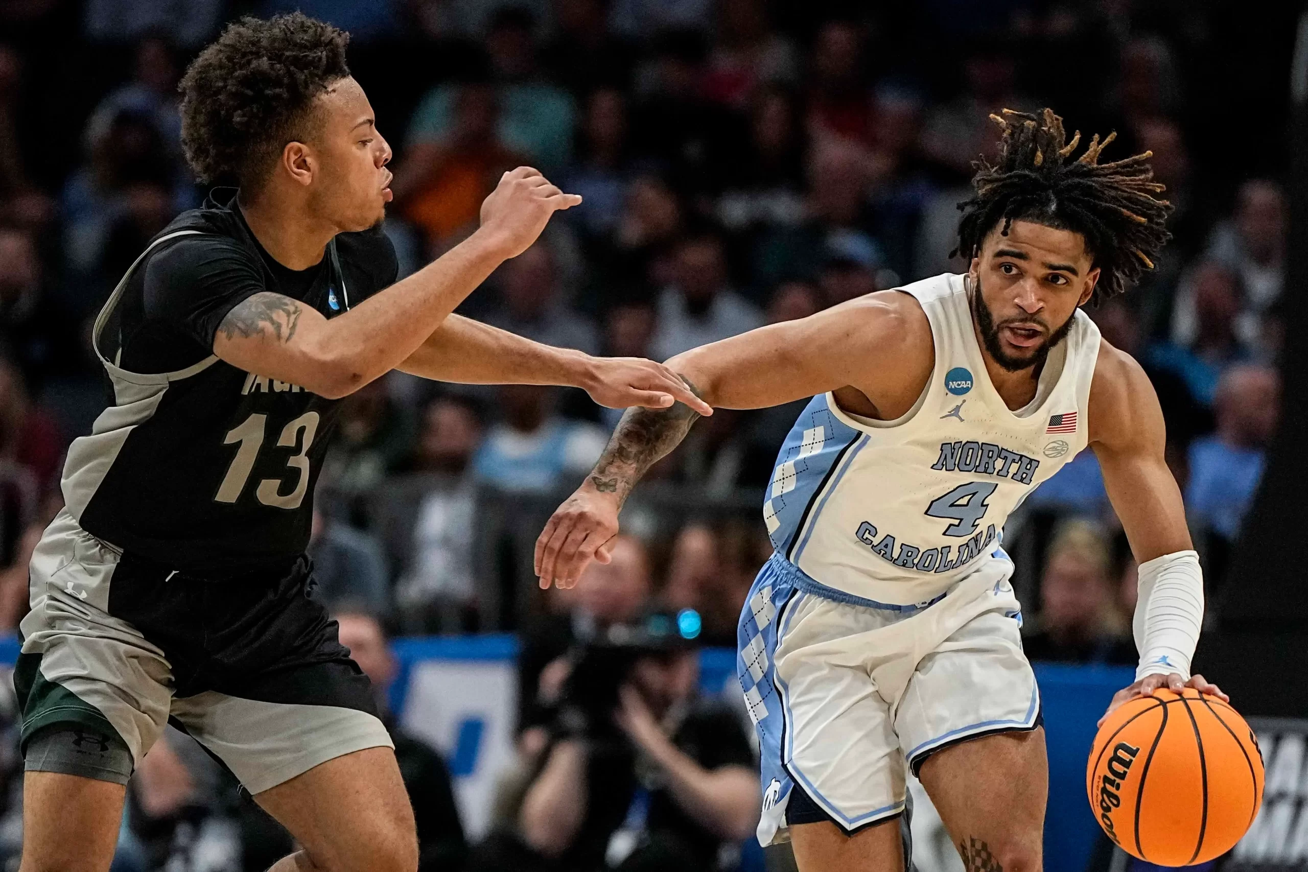North Carolina (28-7) vs Michigan (20-14)